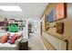 Finished basement featuring a Gathering room with plush white sofa, chairs and decorative decor on walls at 2845 Burgundy Dr, Cumming, GA 30041