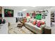 Finished basement featuring a Gathering room with plush white sofa, chairs and decorative decor at 2845 Burgundy Dr, Cumming, GA 30041