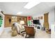 Finished basement featuring a Gathering room with plush white sofa, TV and decorative decor at 2845 Burgundy Dr, Cumming, GA 30041