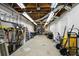 Unfinished basement with exposed ducts and pipes used for storage and workshop at 2845 Burgundy Dr, Cumming, GA 30041