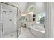 Bright bathroom featuring a spa tub, large vanity, and walk-in shower at 2845 Burgundy Dr, Cumming, GA 30041