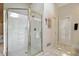 Bathroom featuring a glass enclosed shower, and neutral color palette at 2845 Burgundy Dr, Cumming, GA 30041