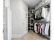 Walk-in closet with custom shelving and ample storage space at 2845 Burgundy Dr, Cumming, GA 30041