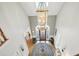Grand foyer featuring a striking chandelier and patterned rug, making an impressive entrance at 2845 Burgundy Dr, Cumming, GA 30041