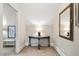 Hallway with neutral walls, and a console table at 2845 Burgundy Dr, Cumming, GA 30041