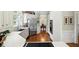 Beautiful kitchen with white cabinets, stainless steel appliances, and hardwood floors at 2845 Burgundy Dr, Cumming, GA 30041