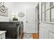 Laundry room with modern washer and dryer, decor, and an exterior door at 2845 Burgundy Dr, Cumming, GA 30041