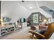 Cozy living room with comfortable seating and a sloped ceiling at 2845 Burgundy Dr, Cumming, GA 30041
