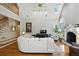 Spacious living room with high ceilings, fireplace, and hardwood floors at 2845 Burgundy Dr, Cumming, GA 30041