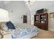 Spacious main bedroom featuring a high vaulted ceiling, built-in shelving, and neutral decor at 2845 Burgundy Dr, Cumming, GA 30041