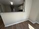Dining area featuring wood floors and kitchen view at 4189 Post Oak Grv, Atlanta, GA 30349