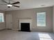 Comfortable living room featuring a fireplace and neutral color palette at 4189 Post Oak Grv, Atlanta, GA 30349