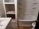Bathroom featuring white sink, tub/shower combo and toilet at 1373 Lucile Sw Ave, Atlanta, GA 30310