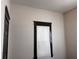 A mostly empty bedroom with neutral paint and a window with a cellular shade at 1373 Lucile Sw Ave, Atlanta, GA 30310