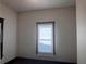 Bright room with neutral walls, a window with cellular shade, and dark wood trim at 1373 Lucile Sw Ave, Atlanta, GA 30310