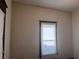 This is a picture of an interior bedroom wall and window with black trim and blinds at 1373 Lucile Sw Ave, Atlanta, GA 30310