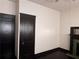 Bedroom featuring dark trim, neutral walls, and an ornamental fireplace at 1373 Lucile Sw Ave, Atlanta, GA 30310