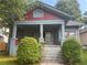 Charming two-story home with a landscaped yard and inviting front porch at 1373 Lucile Sw Ave, Atlanta, GA 30310