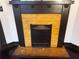 Close up of the fireplace with yellow brick at 1373 Lucile Sw Ave, Atlanta, GA 30310