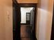 Hallway view showing dark trim, wood floors, and an open doorway at 1373 Lucile Sw Ave, Atlanta, GA 30310