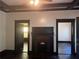 Cozy living room featuring a classic fireplace, hardwood floors and neutral paint at 1373 Lucile Sw Ave, Atlanta, GA 30310