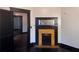 Interior view of a room featuring a fireplace with mantel and hardwood floors at 1373 Lucile Sw Ave, Atlanta, GA 30310