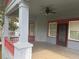 Spacious covered porch featuring sturdy support columns and a ceiling fan at 1373 Lucile Sw Ave, Atlanta, GA 30310