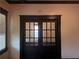 View of interior room featuring dark trim, hardwood floors, and natural light at 1373 Lucile Sw Ave, Atlanta, GA 30310