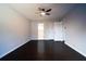 Bedroom with hardwood floors, a ceiling fan and neutral paint at 2333 Wilkins Cv, Decatur, GA 30035