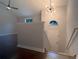 Inviting entryway featuring hardwood floors, stylish lighting, and a staircase, creating a welcoming atmosphere at 2333 Wilkins Cv, Decatur, GA 30035