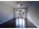 Living room featuring hardwood floors, a large bay window and neutral paint at 2333 Wilkins Cv, Decatur, GA 30035