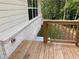 Backyard wooden deck shows privacy and nice view to trees and greenery at 3383 Milan Ct, Douglasville, GA 30135