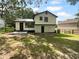 Expansive backyard featuring a large grassy area and a patio perfect for outdoor entertaining at 3867 Cherie Glen Rd, Snellville, GA 30039