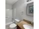 Bathroom featuring tub, shower, granite countertop, and vanity mirror at 3867 Cherie Glen Rd, Snellville, GA 30039