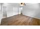 Spacious bedroom with ceiling fan, hardwood floors, and closet at 3867 Cherie Glen Rd, Snellville, GA 30039