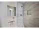 Updated bathroom with frameless shower and modern sink at 183 Peachtree Ct, Riverdale, GA 30274