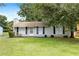 Attractive home features a well-kept lawn, trimmed shrubs, and a classic design for a welcoming curb appeal at 183 Peachtree Ct, Riverdale, GA 30274