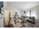 Bright and inviting living room with comfortable seating, modern décor, and ample natural light at 183 Peachtree Ct, Riverdale, GA 30274