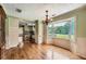 Bright breakfast nook with a large bay window and access to the kitchen at 5190 Due West Nw Rd, Powder Springs, GA 30127