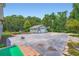 An outside area featuring a garage with a basketball hoop on the side at 5190 Due West Nw Rd, Powder Springs, GA 30127
