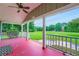 Covered front porch offers a relaxing outdoor space with views of the landscaped yard at 5190 Due West Nw Rd, Powder Springs, GA 30127