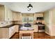Spacious kitchen with modern appliances, granite countertops, and a functional kitchen island at 5190 Due West Nw Rd, Powder Springs, GA 30127