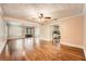 Expansive living room featuring hardwood floors and an abundance of natural light at 5190 Due West Nw Rd, Powder Springs, GA 30127