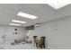 Finished basement with tile flooring, a decorative wall, and living area with a couch at 995 Lewis Ridge Cir, Lawrenceville, GA 30045