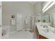 Bright bathroom with a soaking tub, separate shower, and double sink vanity at 995 Lewis Ridge Cir, Lawrenceville, GA 30045