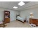 Charming bedroom in finished basement with hardwood floors, soft lighting, and tasteful decor at 995 Lewis Ridge Cir, Lawrenceville, GA 30045