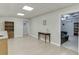 Inviting finished basement living room featuring wood-look flooring and a neutral color scheme at 995 Lewis Ridge Cir, Lawrenceville, GA 30045