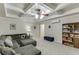 Cozy living room area in the finished basement, featuring coffered ceiling and recessed lights at 995 Lewis Ridge Cir, Lawrenceville, GA 30045