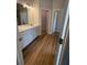 Beautiful bathroom with double vanity and wood-look flooring at 5311 Tuscany Dr, Douglasville, GA 30135