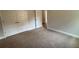 Bedroom showcasing neutral carpet and featuring ample closet space at 5311 Tuscany Dr, Douglasville, GA 30135
